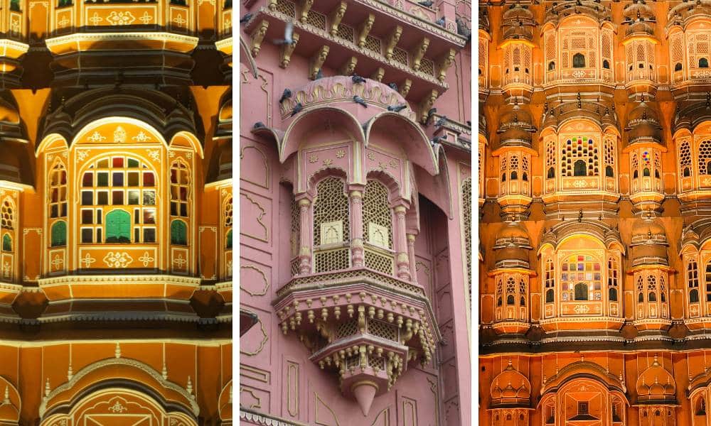 A close-up of the honeycombed jharokha windows and colorful stained glass of the Hawa Mahal in Jaipur.